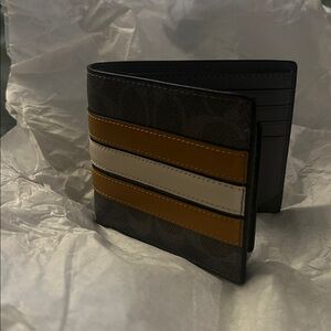 Coach Black, Tan, and White wallet